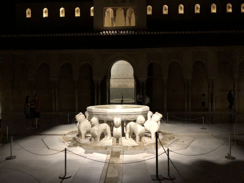 Granada: The Alhambra and Nasrid Palaces Guided Night Tour - Nightfall Magic at the Alhambra Access Pavilion